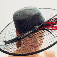 Parasisal straw and knotted sinamay hat with feathers