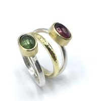 Silver and 18ct gold rings set with tourmaline