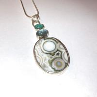 Ocean jasper, tourmaline and chalcedony pendant set in silver