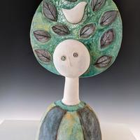 Lady with leaves/earthenware clay and coloured slips and glaze/27cm x 46cm