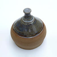 toneware flask with stopper. Height 4.25 inches 