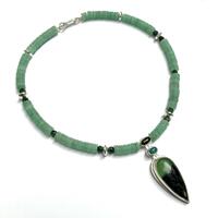 Serpentine set with tourmaline, star diopside with aventurine, emerald and silver beads