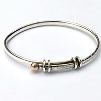 Silver and gold adjustable bangle