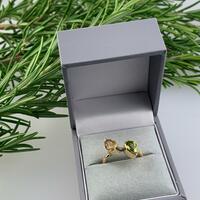 Contemporary ring set with pear shaped Citrine and Peridot in 9ct yellow gold 