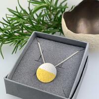 Silver and gold textured pendant