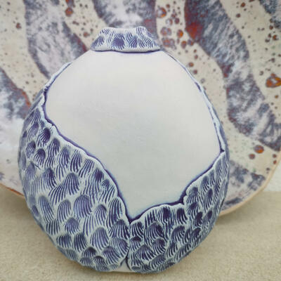 textured earthenware vase