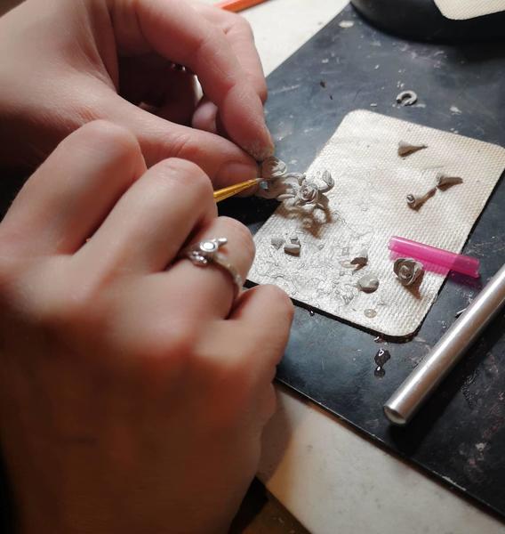 Creating the Rambling Rose pendant with silver clay.