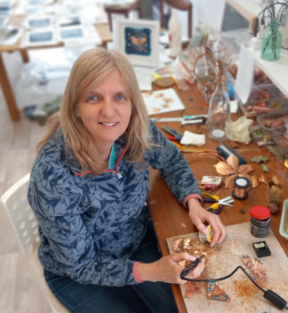 Flora, in her studio in Oakley