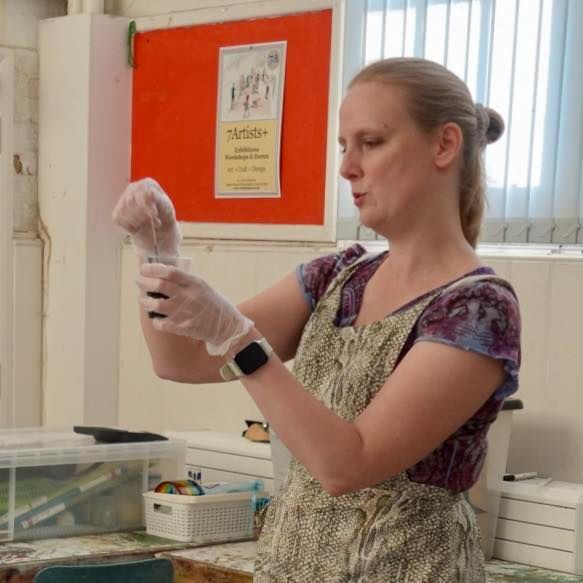 Workshop demonstration of paint mixing