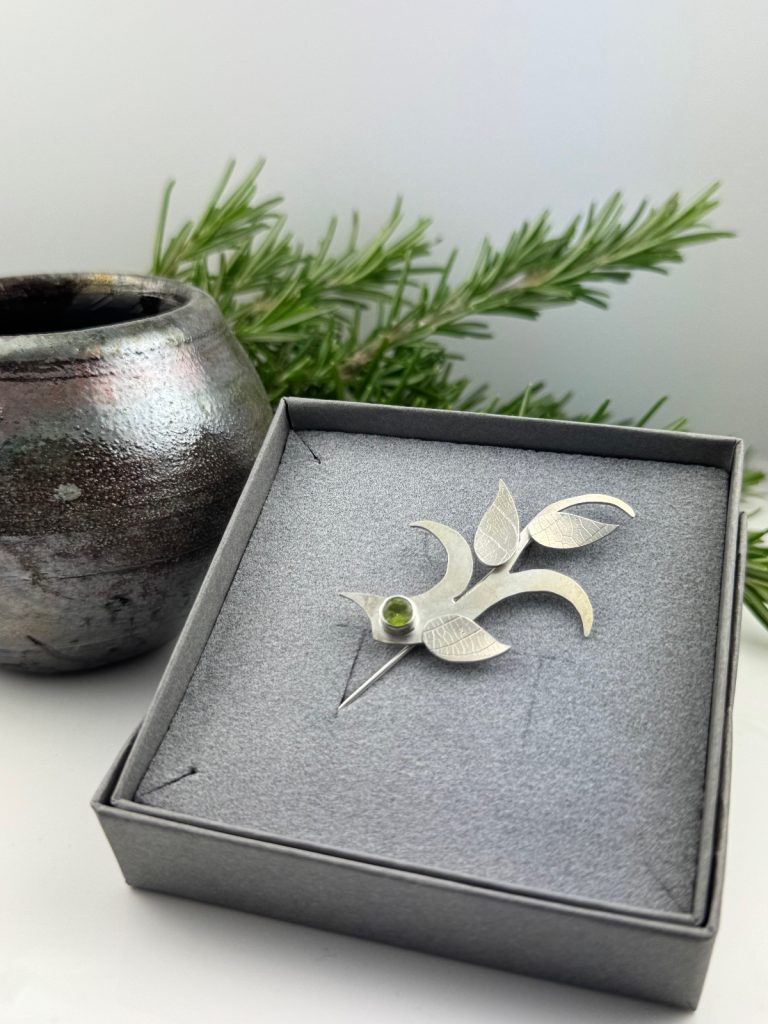Silver and Peridot brooch