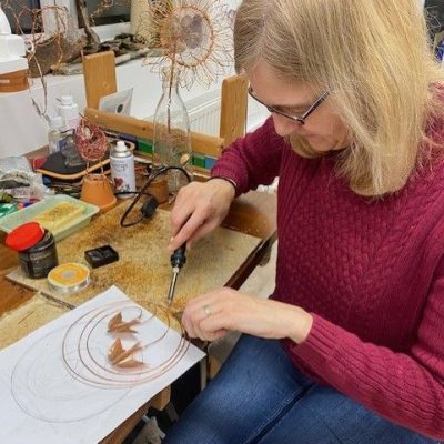 Image of artist at work