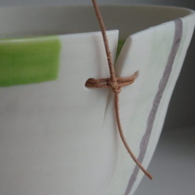 Spring bowl detail. Thrown porcelain with leather.
