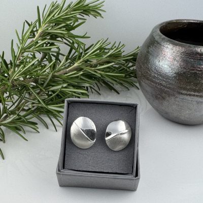 Silver folded and textured stud earrings