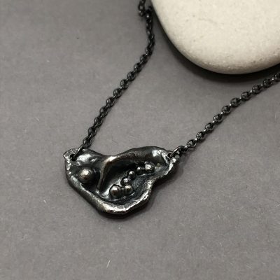Melted silver and bubbles pendant necklace